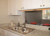 Thumbnail 20 of 28 - Remodeled units have beautiful cabinetry and Adjustable Sink Faucets