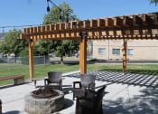 Thumbnail 15 of 20 - Beautiful outdoor firepit area at fox hill apartments
