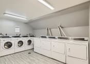 Thumbnail 12 of 20 - on-site laundry facility at fox hill apartments