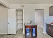 Thumbnail 9 of 28 - Southwest Denver apartment kitchen with spacious pantry