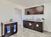 Thumbnail 10 of 28 - Southwest Denver apartment kitchen with cabinets