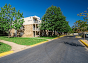 Thumbnail 8 of 8 - A street view of a residential building with the number 5800 on it.