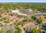 Thumbnail 24 of 24 - an aerial view of a suburban neighborhood with houses and trees