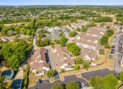 Thumbnail 23 of 24 - an aerial view of a neighborhood with houses and trees