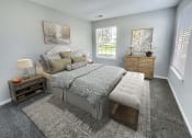 Thumbnail 6 of 30 - a bedroom with a bed and two dressers and a window