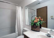 Thumbnail 12 of 30 - apartment bathroom with tub