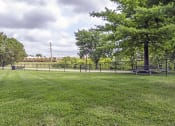 Thumbnail 22 of 30 - dog park with a fence at apartment community