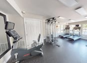 Thumbnail 17 of 30 - fitness center with a treadmill, elliptical machines, and other exercise equipment