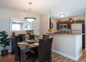 Thumbnail 3 of 30 - dining room table and breakfast bar