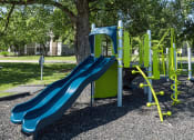 Thumbnail 24 of 30 - playground with a blue slide