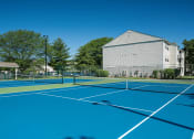 Thumbnail 26 of 30 - tennis court at apartment community