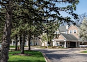 Thumbnail 25 of 26 - Driveway View of Apartment Leasing Office