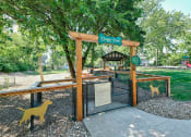 Thumbnail 15 of 16 - dog park at pet friendly apartment community