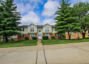 Thumbnail 20 of 22 - apartment building with trees in front of it