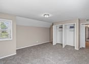 Thumbnail 5 of 27 - an empty room with a closet and a window