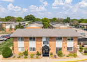 Thumbnail 26 of 28 - our apartments offer a spacious living area and a parking lot