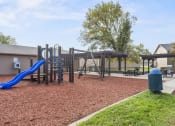 Thumbnail 20 of 21 - our playground is equipped with a swing set and slide