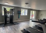 Thumbnail 10 of 16 - fitness center at Golfview Village Townhomes