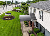 Thumbnail 15 of 18 - Green space in front of building