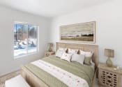 Thumbnail 8 of 19 - a bedroom with a large bed and a large window