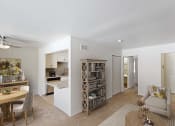 Thumbnail 4 of 19 - a spacious living room with a kitchen in the background