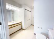 Thumbnail 12 of 24 - Spacious bathroom with storage space