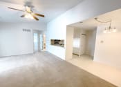 Thumbnail 15 of 24 - a living and dining room with overhead lighting