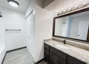 Thumbnail 13 of 24 - bathroom with lots of vanity and storage space and huntington glen apartments