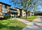 Thumbnail 20 of 24 - outside of apartment building, with sidewalk