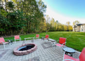Thumbnail 18 of 24 - community firepit at huntington glen apartments