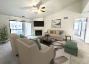 Thumbnail 1 of 24 - a living room with furniture and a ceiling fan