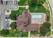 Thumbnail 29 of 29 - A house with a pool in the backyard.