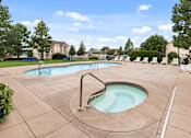 Thumbnail 24 of 29 - A large outdoor swimming pool with a slide.