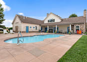 Thumbnail 26 of 29 - A house with a pool in the backyard.