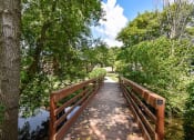 Thumbnail 21 of 25 - wooden Pedestrian Bridge at apartment community