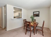 Thumbnail 11 of 25 - Kitchen and Dining Area in apartment