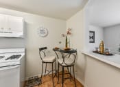 Thumbnail 6 of 25 - Kitchen and Dining Area
