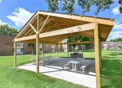 Thumbnail 19 of 25 - grilling area at apartment community