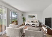 Thumbnail 4 of 22 - a living room with a couch and chairs and a television