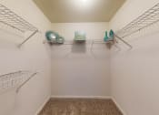 Thumbnail 7 of 15 - spacious closet in primary bedroom