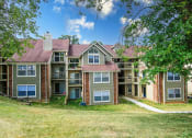 Thumbnail 13 of 15 - apartment building with shade trees