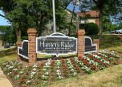 Thumbnail 15 of 15 - welcome sign for Hunter's Ridge Apartments