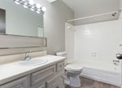 Thumbnail 9 of 16 - a bathroom with a sink toilet and a shower