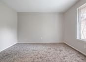 Thumbnail 6 of 16 - bedroom with a carpeted floor and a window