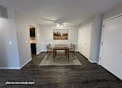 Thumbnail 2 of 16 - Apartment dining area with hardwood style flooring