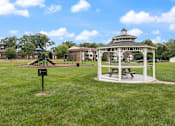 Thumbnail 16 of 16 - gazebo with a playground at apartment community