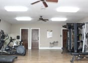 Thumbnail 11 of 16 - well equipped apartment gym at homestead apartments
