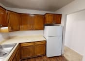 Thumbnail 6 of 18 - Kitchen area of two bedroom apartment in Southfield Michigan's chateau riviera apartments