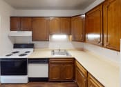 Thumbnail 5 of 18 - Apartment kitchen at chateau riviera with oven and dishwasher