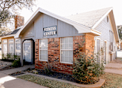 Thumbnail 19 of 25 - A small building with a sign that says Fitness Center.